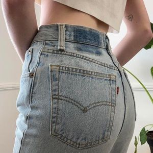 Lightwash classic Levi 501 style denim blue jeans